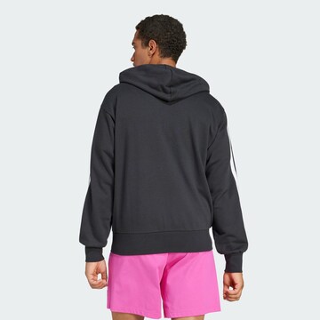 ADIDAS SPORTSWEAR Urheilullinen collegetakki 'Essentials' värissä musta