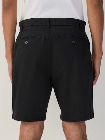 Loosefit Pantalon chino Next en noir