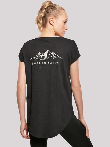 T-shirt 'Lost in nature' F4NT4STIC en noir : devant