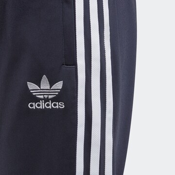 Effilé Pantalon ADIDAS ORIGINALS en bleu