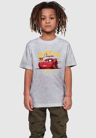 ABSOLUTE CULT Shirt 'Cars - Piston Cup Champion' in Grijs: voorkant
