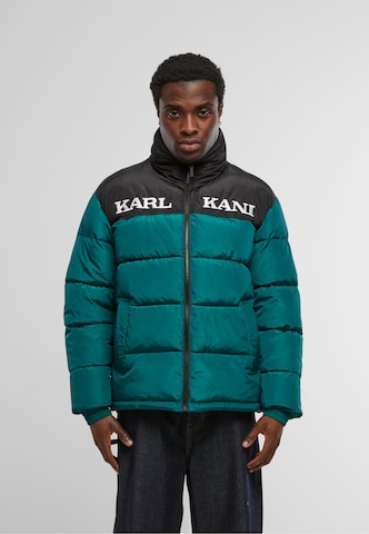 Karl Kani Between-season jacket 'Retro Essential' in Green: front