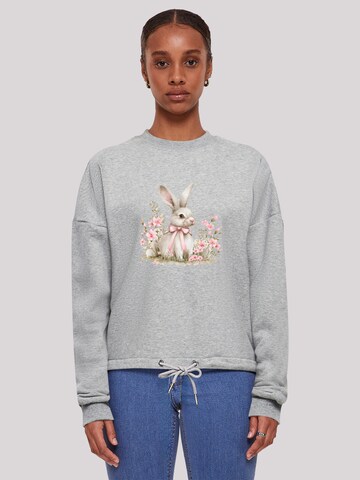 Sweat-shirt 'Niedlicher Osterhase mit Blumen' F4NT4STIC en gris : devant