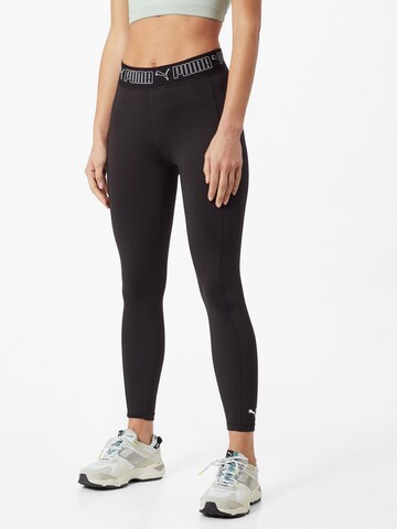 PUMA - Skinny Pantalón deportivo en negro: frente