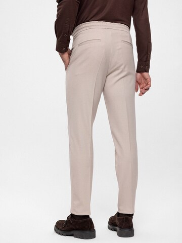 Antioch Regular Trousers with creases in Beige