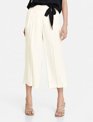 TAIFUN Loose fit Pleat-front trousers in Beige: front