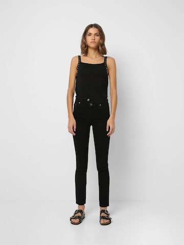 Skinny Jeans di Scalpers in nero