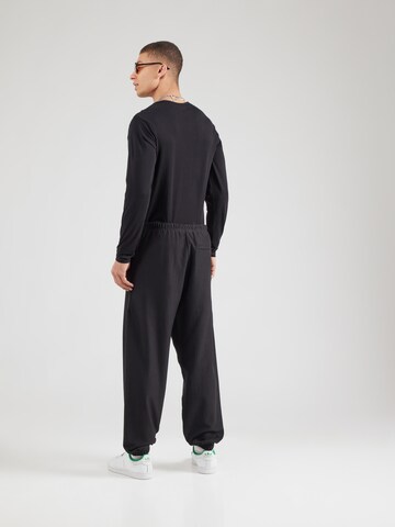 Calvin Klein Jeans Tapered Hose in Schwarz