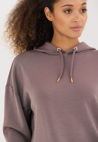 Athlecia Sports sweatshirt 'NAMIER W' in Brown