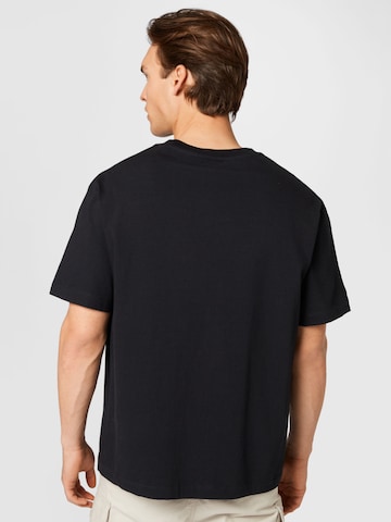 T-Shirt 'BHAJAN' MELAWEAR en noir