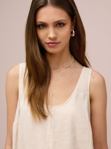 Haut Next en beige