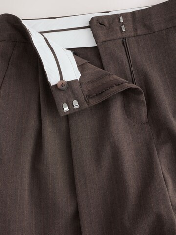 Wide leg Pantaloni con pieghe di Next in marrone