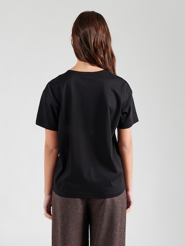 Tricou 'MMAina' de la MOS MOSH pe negru