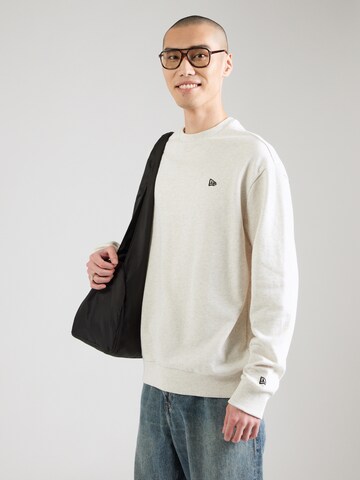 NEW ERA Sweatshirt 'ESSNTIALS' in Grey: front