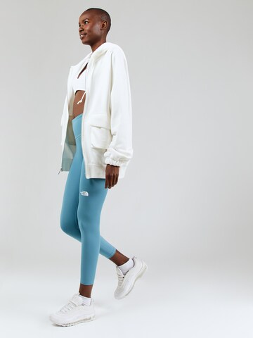 THE NORTH FACE Skinny Spodnie sportowe 'FLEX' w kolorze niebieski