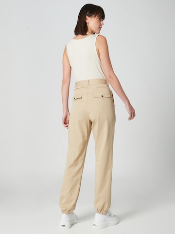 Guido Maria Kretschmer Women - Tapered Pantalón plisado 'Nicola' en beige