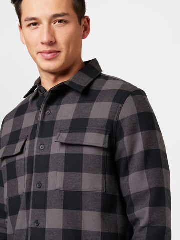 OAKLEY - Ajuste regular Camisa funcional 'BEAR COZY' en negro