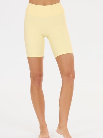 Skinny Pantaloni sport de la Athlecia pe galben: față
