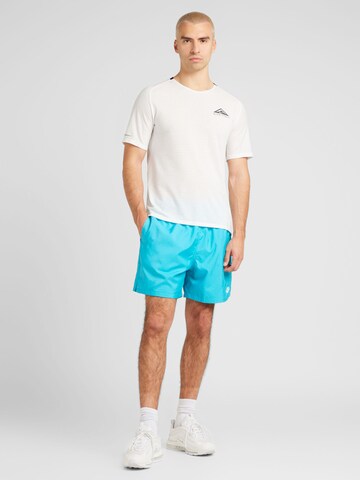 Nike Sportswear Voľný strih Nohavice 'Club' - Modrá