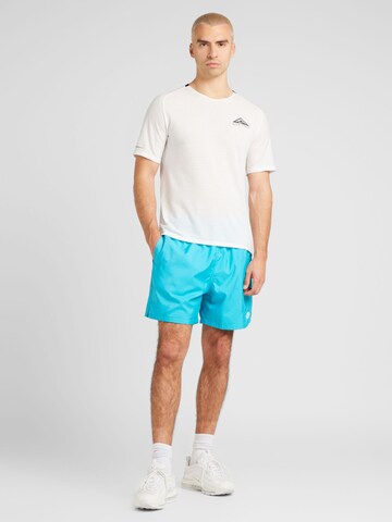 Nike Sportswear Loosefit Broek 'Club' in Blauw