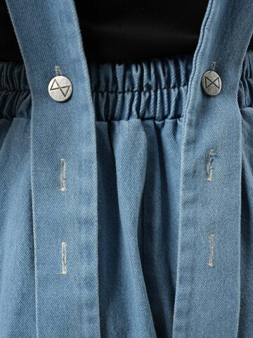 Wide leg Jeans con pettorina di Metamorphoza in blu