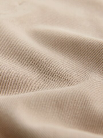 Skinny Leggings di Next in beige