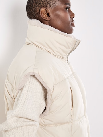 Apricot Klederdrachtjas ' ' in Beige