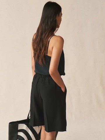 Loosefit Pantaloni con pieghe di Next in nero