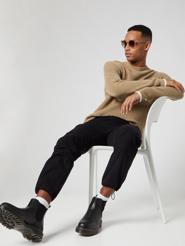 Kosta Williams x About You Regular Cargo trousers in Black