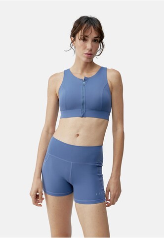 Born Living Yoga Sporttop 'Eider' in Blauw: voorkant