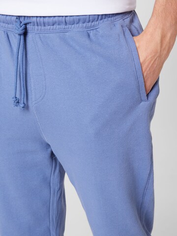 Cotton On גזרה משוחררת מכנסיים בכחול