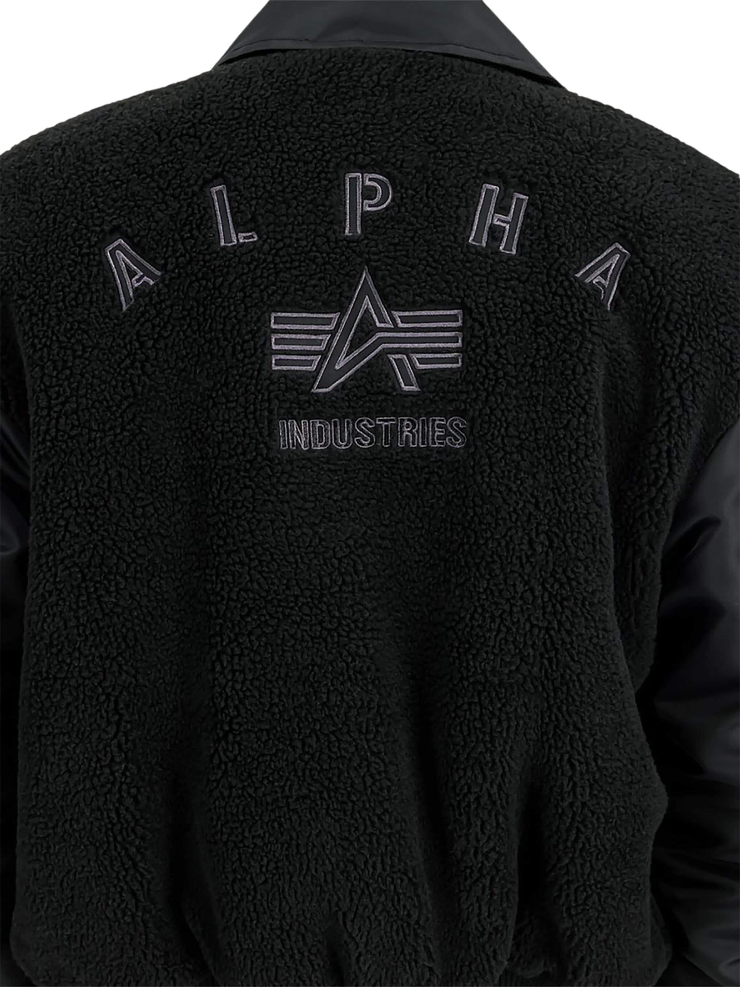 ALPHA INDUSTRIES Ulkoilutakki 'CWU-45/P' värissä musta