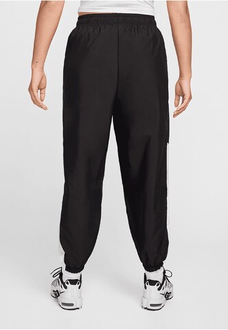 regular Pantaloni sportivi di NIKE in nero