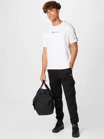 Champion Authentic Athletic ApparelTapered Cargo hlače 'Legacy' - crna boja