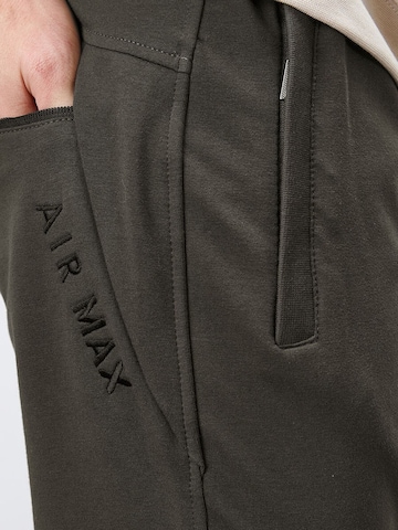 Tommy Life - Skinny Calças de desporto 'Jogginghose' em verde