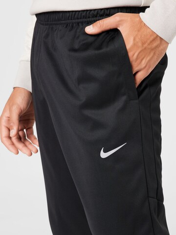 NIKE Slimfit Sportsbukser 'Challenger' i sort