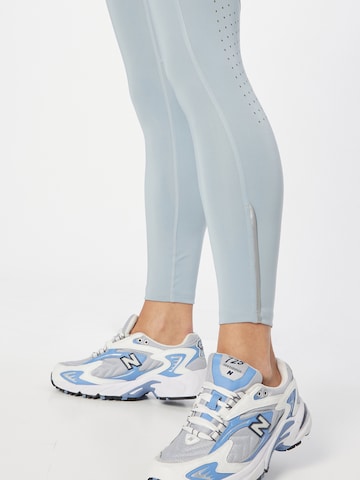 UNDER ARMOUR Skinny Športové nohavice 'Fly Fast 3.0' - Modrá