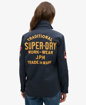 Veste mi-saison Superdry en bleu : devant