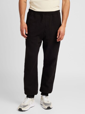 Pegador - Tapered Pantalón en negro: frente