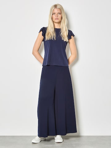 Haut Apricot en bleu