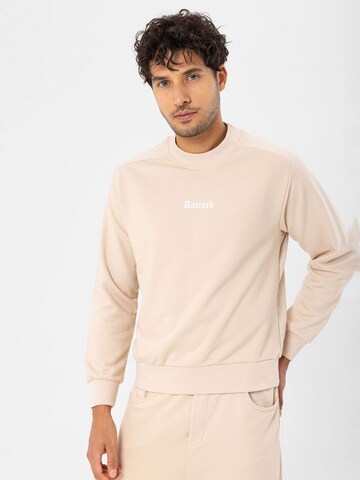 Antioch Sweatshirt i beige