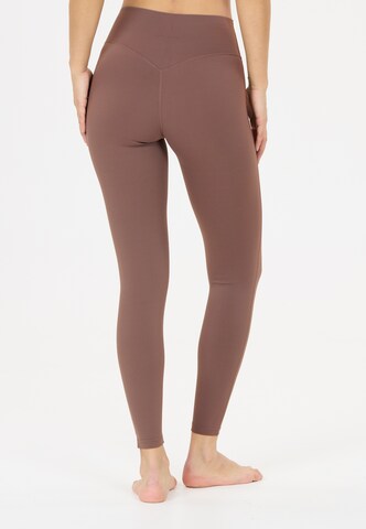 Athlecia Regular Tights 'Eman' in Braun