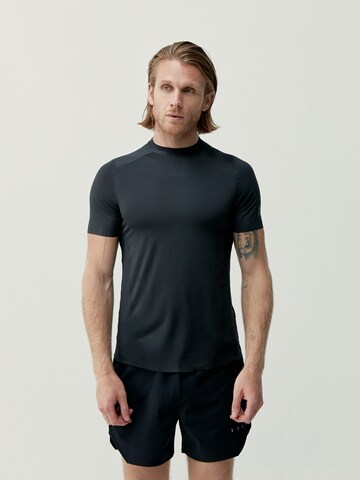 Born Living Yoga Performance Shirt ' Chad ' in Black: front