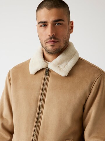 GUESS Between-Season Jacket in Brown