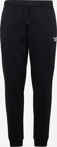 Tapered Pantaloni sportivi di Reebok in nero: frontale