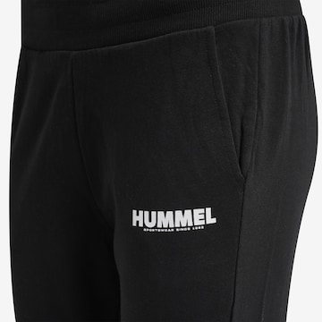 Tapered Pantaloni sport de la Hummel pe negru
