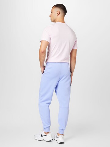 Effilé Pantalon Nike Sportswear en violet