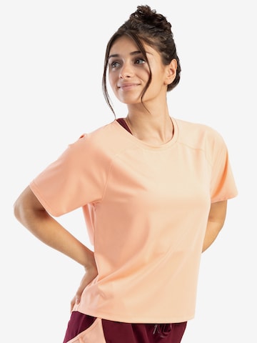 T-shirt fonctionnel Spyder en orange : devant