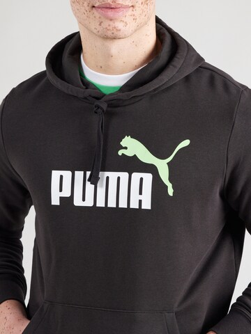 PUMASportska sweater majica 'Ess 2 No. 1' - crna boja
