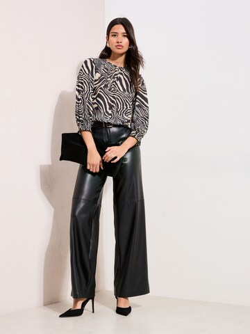 Friends Like These - Blusa en negro